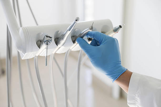 Professional Tooth Extraction technician working in High Rolls, NM